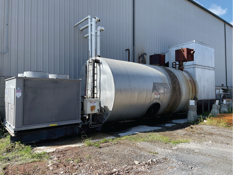 steel building, round steel tank, air conditioner, gravel ground