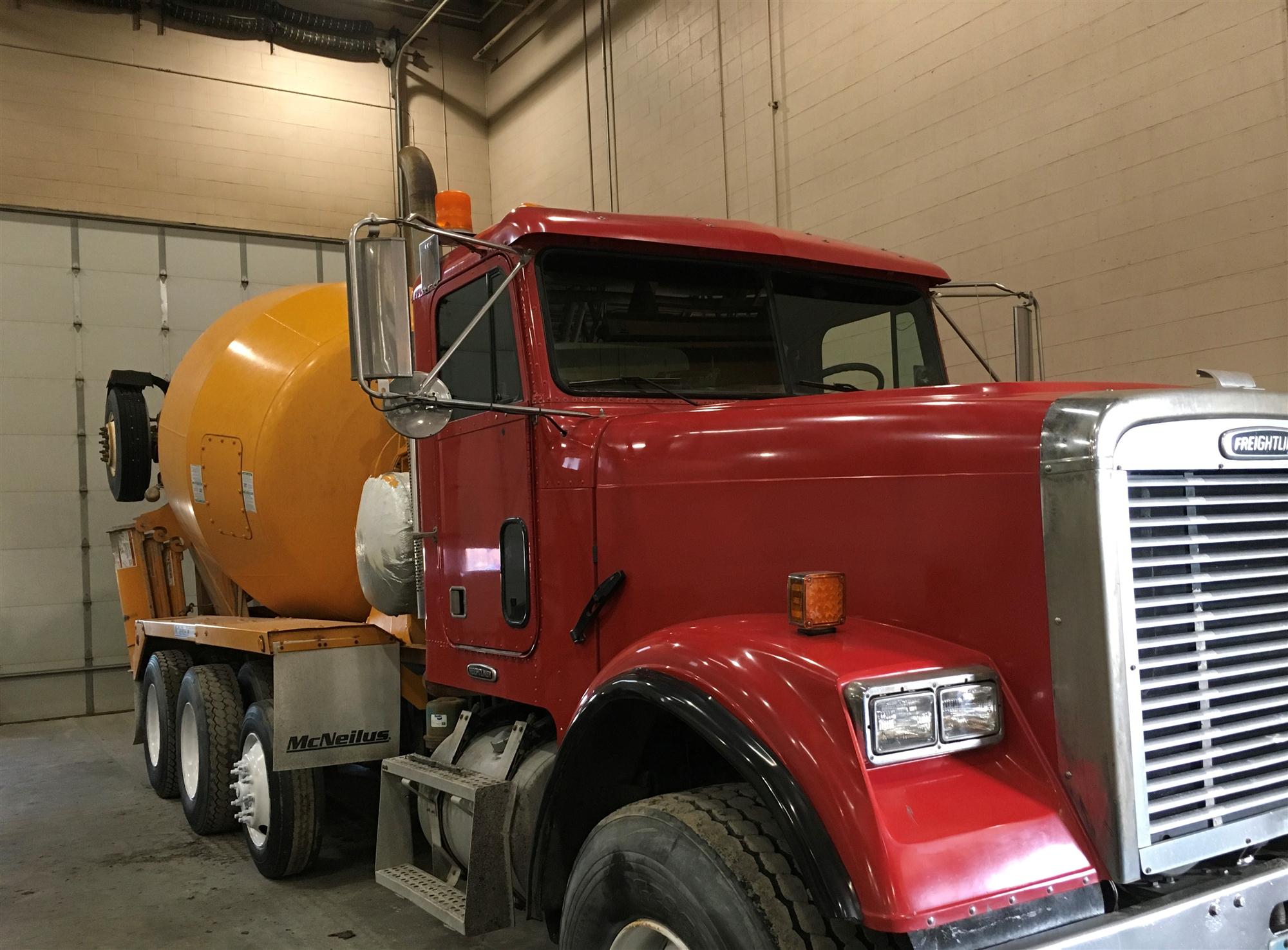 1999 Freightliner / Mcneilus ready mix concrete mixer truck for sale