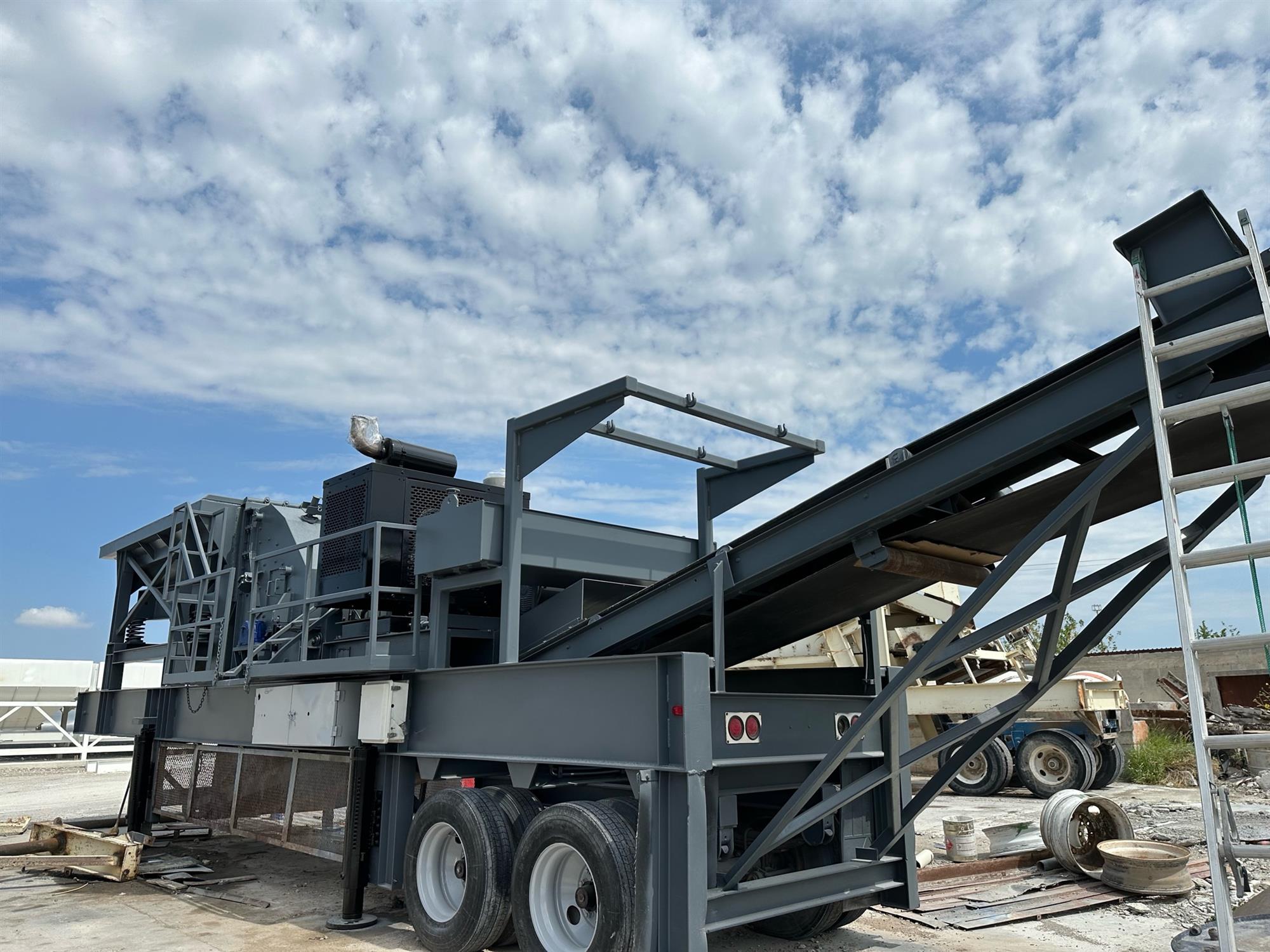 blue sky, steel structure on wheels